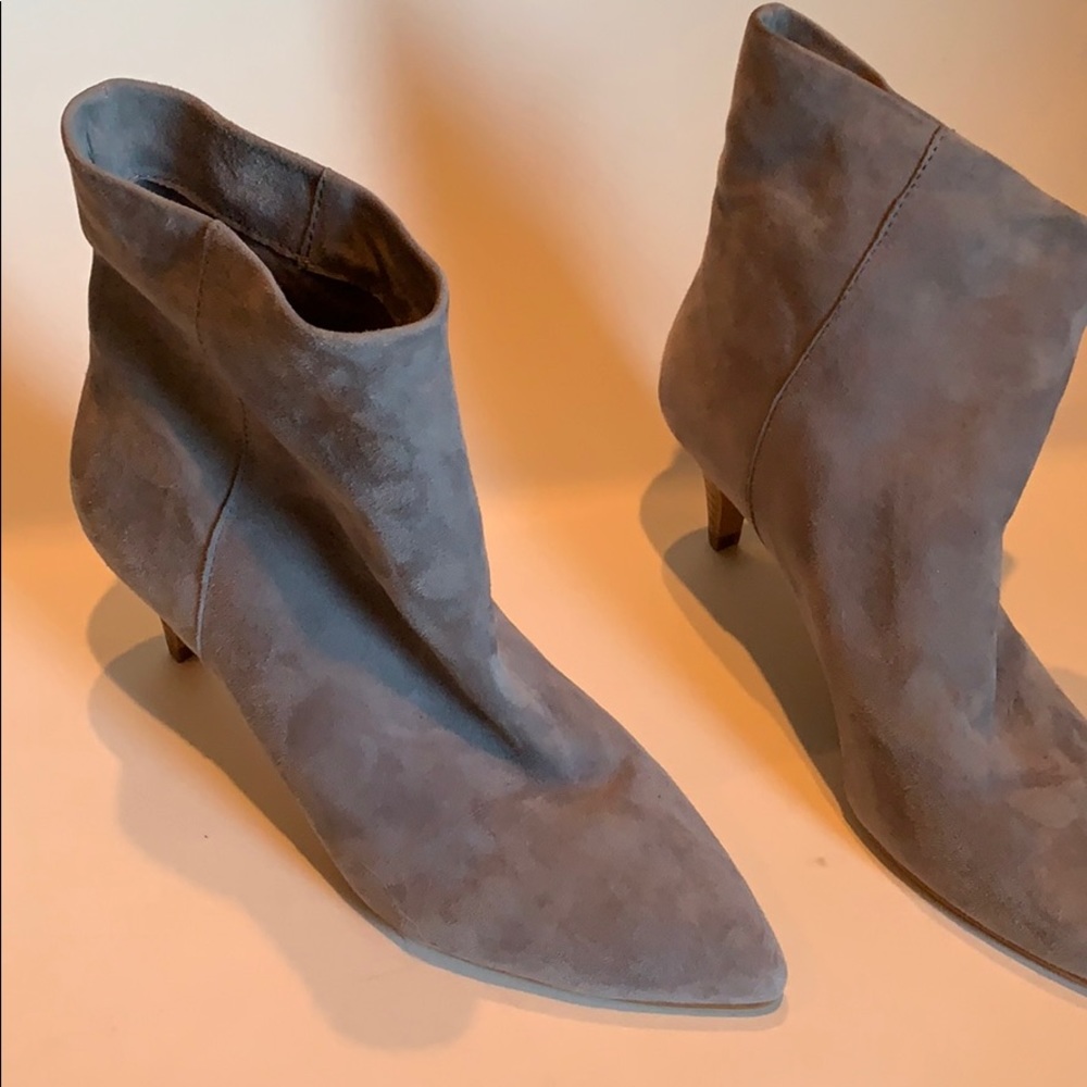 Light gray suede booties with kitten heel.